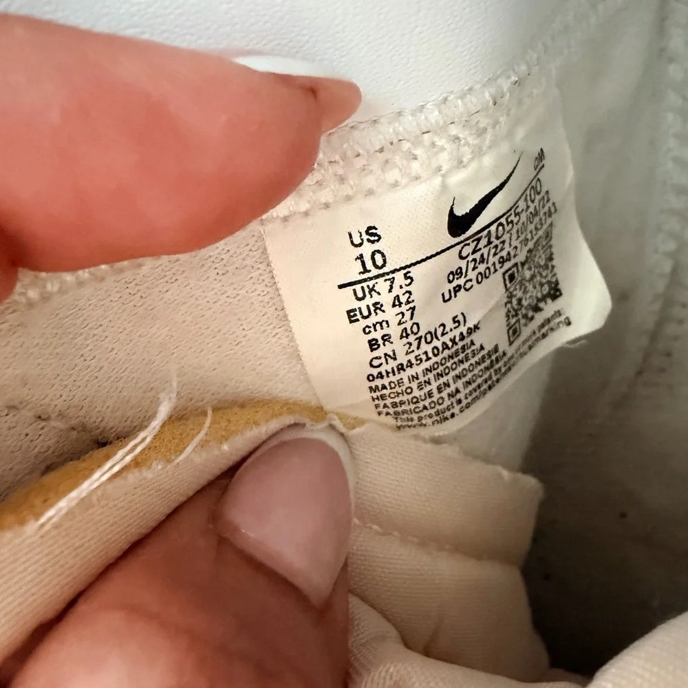 Nike Womens White High-Top Sneakers with Black Swoosh